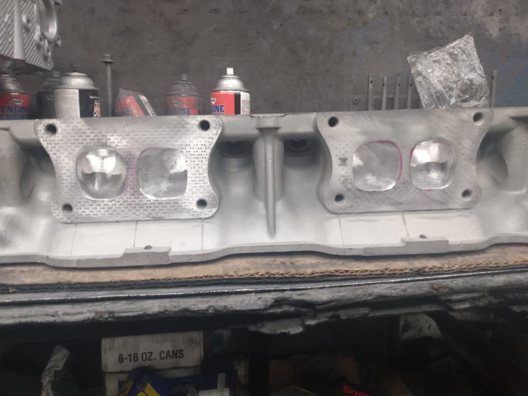 Aluminum cylinder head on the bench during an engine rebuild